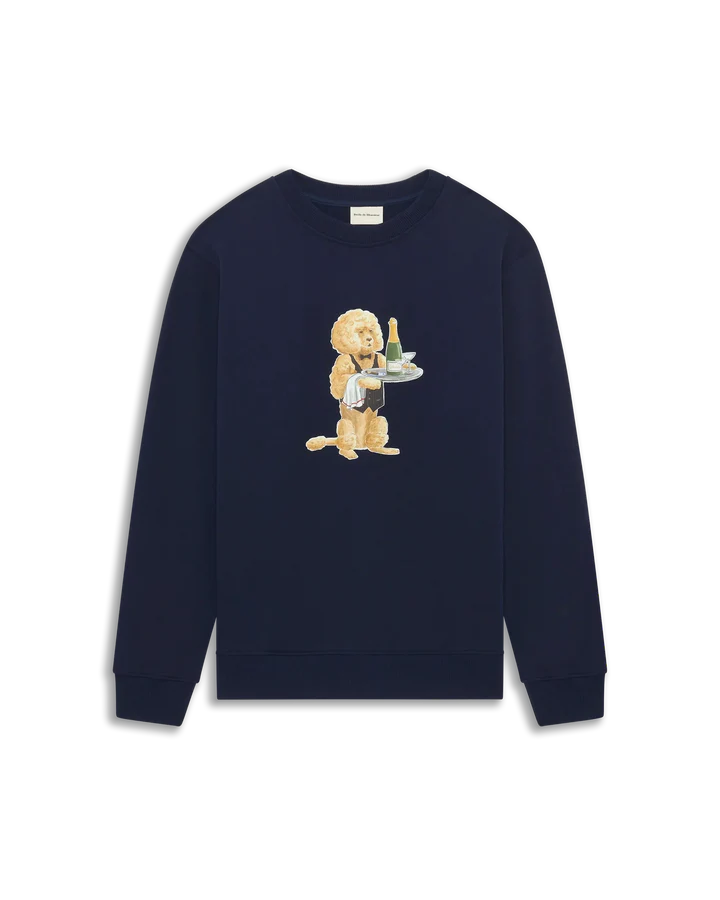 Le Sweatshirt Poodle från Drôle De Monsieur. Marinblå sweatshirt med tryck på bröstet. Hundtryck med champagneflaska 