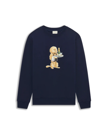 Le Sweatshirt Poodle från Drôle De Monsieur. Marinblå sweatshirt med tryck på bröstet. Hundtryck med champagneflaska 