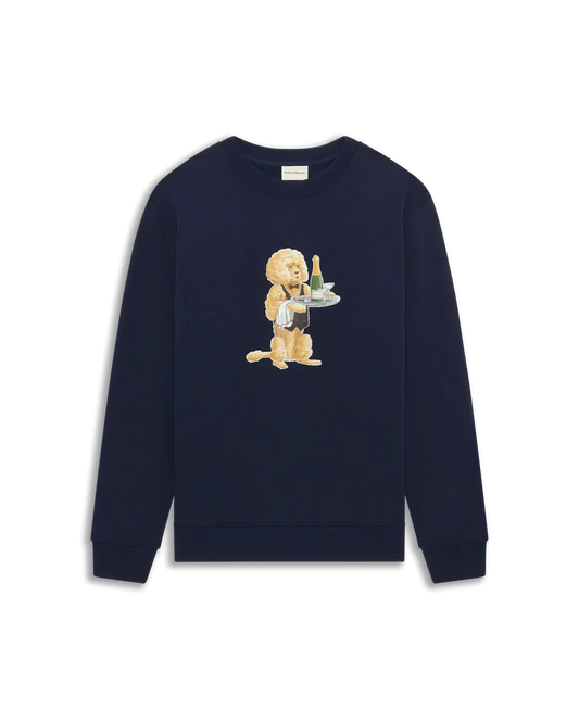 Le Sweatshirt Poodle från Drôle De Monsieur. Marinblå sweatshirt med tryck på bröstet. Hundtryck med champagneflaska 